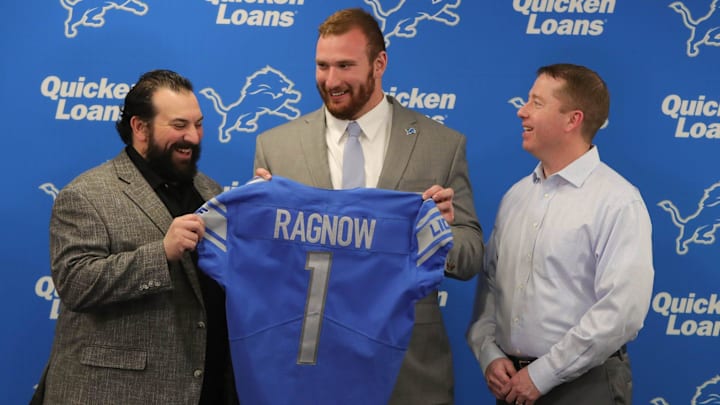 Former Lions head coach Matt Patricia and first round draft pick Arkansas center Frank Ragnow with former GM Bob Quinn