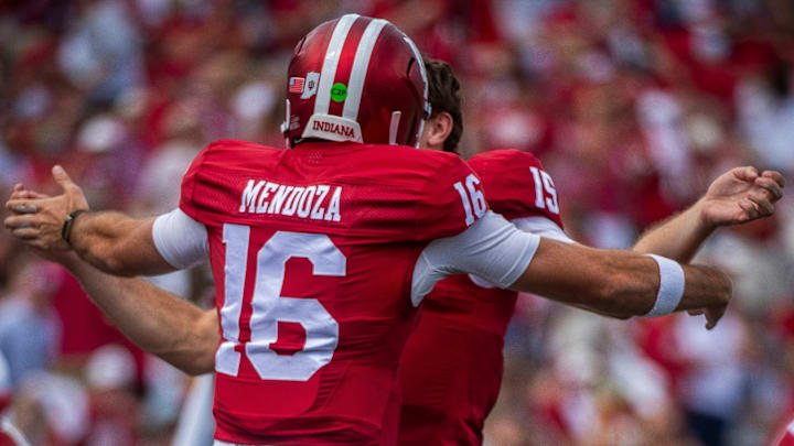 Indiana's Alberto Mendoza (16) and Fernando Mendoza (15) celebrate Alberto's touchdown pass against Kennesaw State at Memorial Stadium on Saturday, Sept. 6, 2025. Indiana's Alberto Mendoza (16) and Fernando Mendoza (15) celebrate Alberto's touchdown pass against Kennesaw State at Memorial Stadium on Saturday, Sept. 6, 2025.