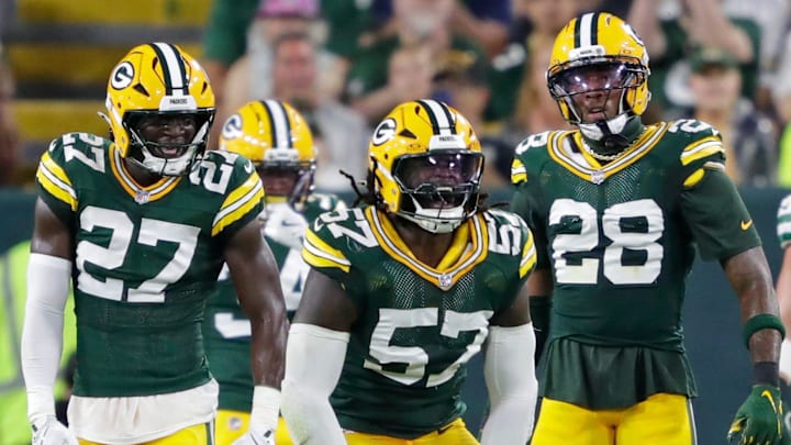 Green Bay Packers defensive end Brenton Cox Jr. (57) celebrates sacking New York Jets quarterback Brady Cook. Green Bay Packers defensive end Brenton Cox Jr. (57) celebrates sacking New York Jets quarterback Brady Cook.