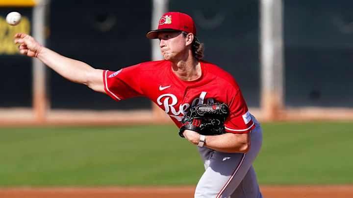 Cincinnati Reds pitcher Brady Singer (51) throws a pitch Cincinnati Reds pitcher Brady Singer (51) throws a pitch
