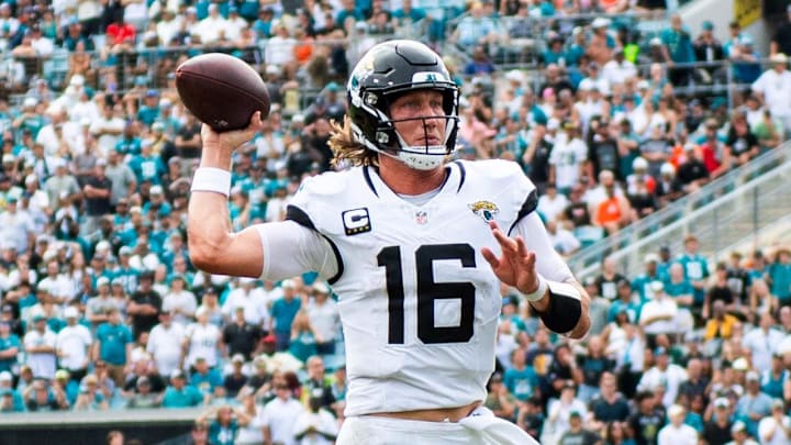 Sep 15, 2024; Jacksonville, Florida, USA; Jacksonville Jaguars quarterback Trevor Lawrence (16) scrambles against the Cleveland Browns in the fourth quarter  at EverBank Stadium. Mandatory Credit: Jeremy Reper-Imagn Images