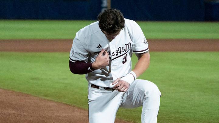 Texas A&M Aggies' Gavin Grahovac (9) prays before the Auburn Tigers take on the Texas A&M Aggies during the SEC baseball tournament at Hoover Metropolitan Stadium in Hoover, Alabama, on Friday, May 22, 2026. Texas A&M Aggies' Gavin Grahovac (9) prays before the Auburn Tigers take on the Texas A&M Aggies during the SEC baseball tournament at Hoover Metropolitan Stadium in Hoover, Alabama, on Friday, May 22, 2026.