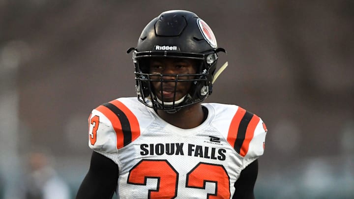 Washington linebacker Randolph Kpai stands on the field between plays on Friday, October 30, in the