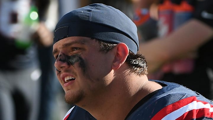 Sep 28, 2025; Foxborough, Massachusetts, USA; New England Patriots offensive tackle Will Campbell (66) talks to a teammate during the second half against the Carolina Panthers at Gillette Stadium. Mandatory Credit: Bob DeChiara-Imagn Images