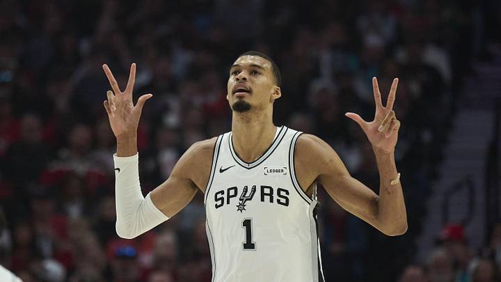 Apr 26, 2026; Portland, Oregon, USA; San Antonio Spurs forward Victor Wembanyama (1) celebrates a three point basket by guard De'aaron Fox (4) during the first half of game four of the first round of the 2026 NBA Playoffs against the Portland Trail Blazers at Moda Center. Mandatory Credit: Troy Wayrynen-Imagn Images