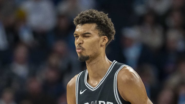 Dec 29, 2024; Minneapolis, Minnesota, USA; San Antonio Spurs center Victor Wembanyama (1) reacts after making a shot against the Minnesota Timberwolves in the first half at Target Center. Mandatory Credit: Jesse Johnson-Imagn Images