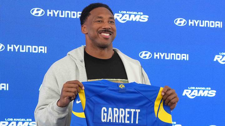 Jun 2, 2026; Woodland Hills, CA, USA; Los Angeles Rams defensive end Myles Garrett (95) poses with jersey at press conference at Rams Practice Facility. Mandatory Credit: Kirby Lee-Imagn Images Jun 2, 2026; Woodland Hills, CA, USA; Los Angeles Rams defensive end Myles Garrett (95) poses with jersey at press conference at Rams Practice Facility. Mandatory Credit: Kirby Lee-Imagn Images