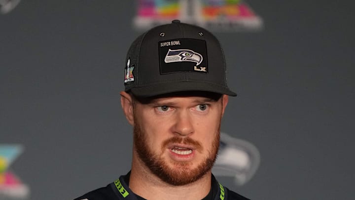 Seattle Seahawks quarterback Sam Darnold (14) talks to media members.