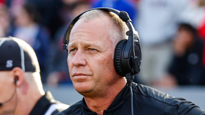 Nov 9, 2024; Raleigh, North Carolina, USA; North Carolina State Wolfpack head coach Dave Doeren looks on prior to the first half of the game against Duke Blue Devils at Carter-Finley Stadium. Mandatory Credit: Jaylynn Nash-Imagn Images
