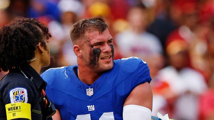New York Giants linebacker Micah McFadden is carted off the field New York Giants linebacker Micah McFadden is carted off the field