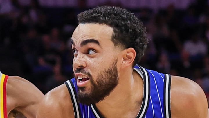 Orlando Magic guard Tyus Jones drives to the basket against Atlanta Hawks guard Trae Young. Orlando Magic guard Tyus Jones drives to the basket against Atlanta Hawks guard Trae Young.