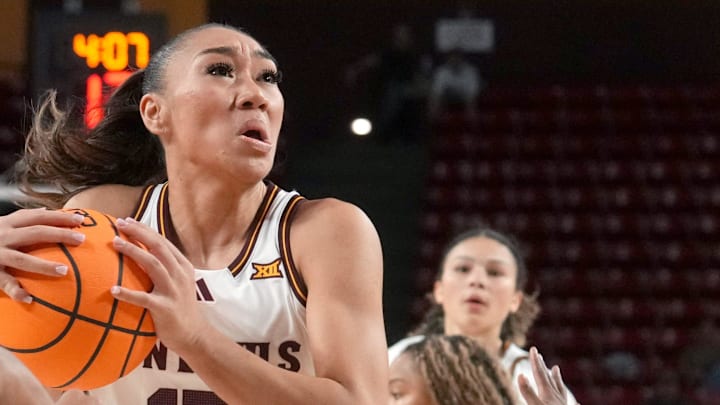ASU Sun Devils guard Last-Tear Poa (13) drives into the lane as Coppin State Bald Eagles guard Skylar Barnes (5) defends at Desert Financial Arena on Nov. 3, 2025.