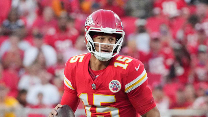 Aug 22, 2025; Kansas City, Missouri, USA; Kansas City Chiefs quarterback Patrick Mahomes (15) drops back to  pass against the Chicago Bears during the first half of the game at GEHA Field at Arrowhead Stadium. Mandatory Credit: Denny Medley-Imagn Images