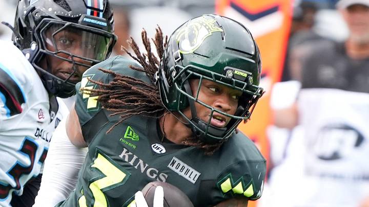 Louisville’s James Robinson gets a first down against the Dallas Renegades at Lynn Family Stadium