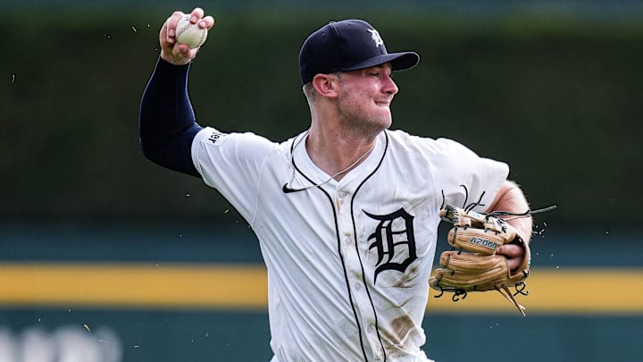 Detroit Tigers shortstop Trey Sweeney (27) looks to throw towards first base against Cleveland Guardians during the seventh inning at Comerica Park in Detroit on Thursday, Sept. 18, 2025. Detroit Tigers shortstop Trey Sweeney (27) looks to throw towards first base against Cleveland Guardians during the seventh inning at Comerica Park in Detroit on Thursday, Sept. 18, 2025.