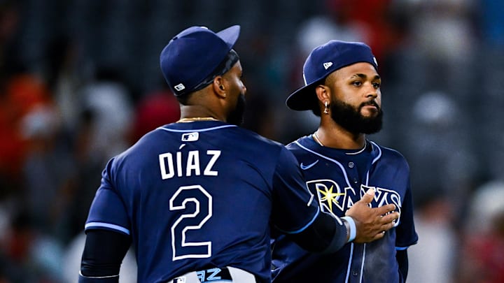 Tampa Bay Rays first baseman Yandy Diaz (2) and third baseman Junior Caminero (13) celebrate after a win. Tampa Bay Rays first baseman Yandy Diaz (2) and third baseman Junior Caminero (13) celebrate after a win.
