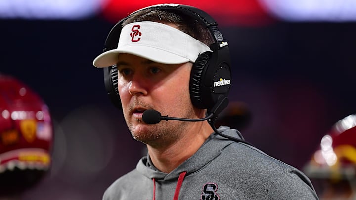 Dec 2, 2022; Las Vegas, NV, USA; Southern California Trojans head coach Lincoln Riley watches game action against the Utah Utes during the second half in the PAC-12 Football Championship at Allegiant Stadium. Mandatory Credit: Gary A. Vasquez-Imagn Images