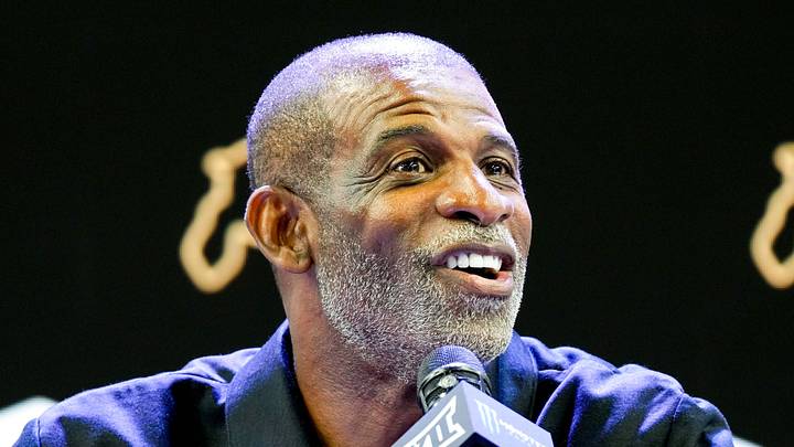 Jul 7, 2026; Frisco, TX, USA; Colorado head coach Deion Sanders speaks to reporters during Big 12 Conference Football Media Days at The Star. Mandatory Credit: Raymond Carlin III-Imagn Images Jul 7, 2026; Frisco, TX, USA; Colorado head coach Deion Sanders speaks to reporters during Big 12 Conference Football Media Days at The Star. Mandatory Credit: Raymond Carlin III-Imagn Images