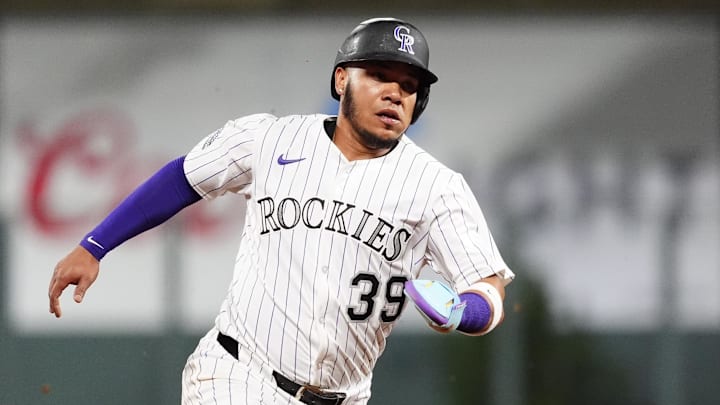 Jun 7, 2025; Denver, Colorado, USA; Colorado Rockies second baseman Thairo Estrada (39) advance to third in the fifth inning against the New York Mets at Coors Field.