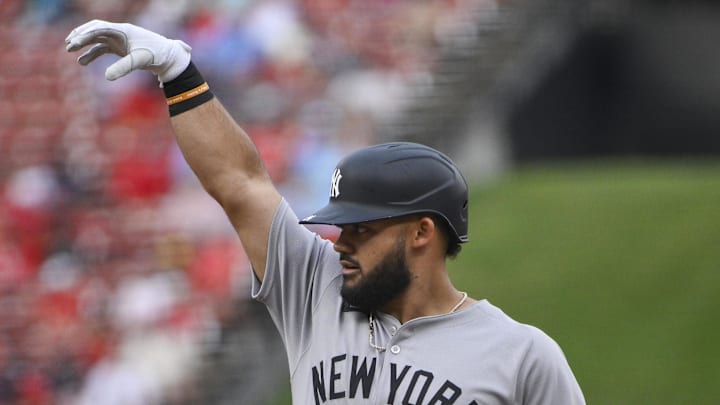 Aug 16, 2025; St. Louis, Missouri, USA;  New York Yankees left fielder Jasson Dominguez (24) reacts after hitting a one run single against the St. Louis Cardinals during the first inning at Busch Stadium. Mandatory Credit: Jeff Curry-Imagn Images