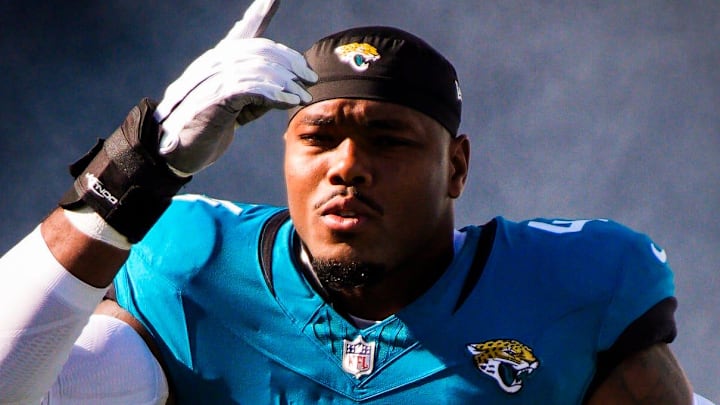 Jacksonville Jaguars defensive end Travon Walker (44) enters the stadium before an NFL football game at EverBank Stadium, Sunday, Dec. 14, 2025, in Jacksonville, Fla. Jacksonville Jaguars defensive end Travon Walker (44) enters the stadium before an NFL football game at EverBank Stadium, Sunday, Dec. 14, 2025, in Jacksonville, Fla.