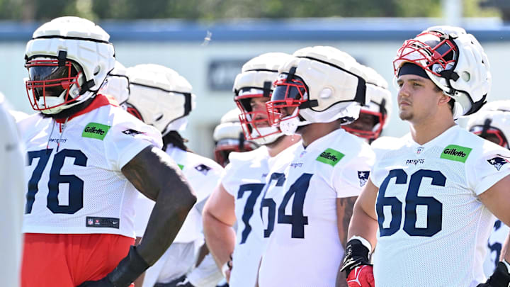 Jul 23, 2025; Foxborough, MA, USA; New England Patriots offensive tackle Will Campbell (66) look on before the start of drills  at training camp at Gillette Stadium. Mandatory Credit: Eric Canha-Imagn Images