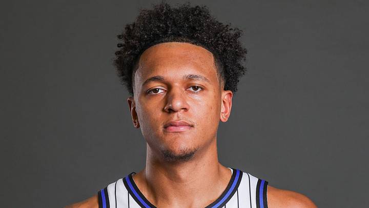 Sep 28, 2026; Orlando, FL, USA;  Orlando Magic forward Paolo Banchero (5) poses for a picture during media day at AdventHealth Training Center.  Mandatory Credit: Mike Watters-Imagn Images