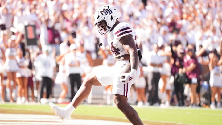 Mississippi State running back Fluff Bothwell (24) celebrates a touchdown during a college football game between Tennessee and Mississippi State at Davis Wade Stadium in Starkville, Miss., on Sept. 27, 2025.
