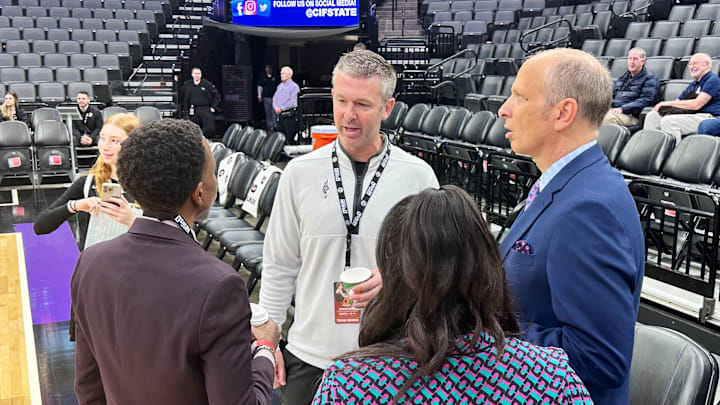 Ryan Coleman, who coached boys and girls basketball at Shalhevet, speaks with media members before a CIF State title game at the Golden 1 Center in Sacramento.