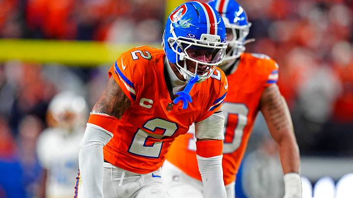 Jan 4, 2026; Denver, Colorado, USA; Denver Broncos cornerback Pat Surtain II (2) reacts to his tackle during the fourth quarter against the Los Angeles Chargers at Empower Field at Mile High. Jan 4, 2026; Denver, Colorado, USA; Denver Broncos cornerback Pat Surtain II (2) reacts to his tackle during the fourth quarter against the Los Angeles Chargers at Empower Field at Mile High.