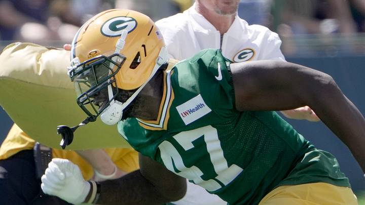 Green Bay Packers edge rusher Nyjalik Kelly runs through a special teams drill at training camp. Green Bay Packers edge rusher Nyjalik Kelly runs through a special teams drill at training camp.