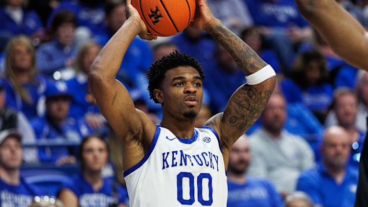 Feb 28, 2026; Lexington, Kentucky, USA; Kentucky Wildcats guard Otega Oweh (00) looks to pass the ball during the second half against the Vanderbilt Commodores at Rupp Arena at Central Bank Center. Mandatory Credit: Jordan Prather-Imagn Images