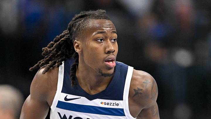 Mar 30, 2026; Dallas, Texas, USA; Minnesota Timberwolves guard Ayo Dosunmu (13) brings the ball up court against the Dallas Mavericks during the second quarter at the American Airlines Center. Mandatory Credit: Jerome Miron-Imagn Images