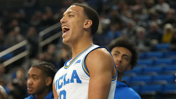 Nov 15, 2024; Los Angeles, California, USA; UCLA Bruins guard Kobe Johnson (0) celebrates against the Lehigh Mountain Hawks in the second half at Pauley Pavilion presented by Wescom. Mandatory Credit: Kirby Lee-Imagn Images