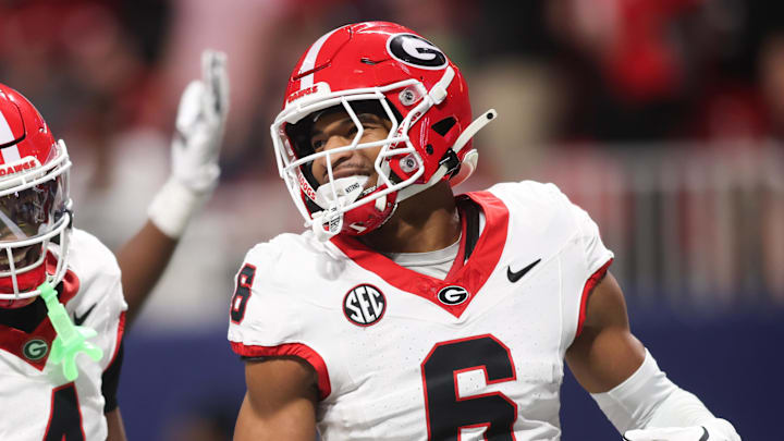 Dec 6, 2025; Atlanta, GA, USA; Georgia Bulldogs defensive back Daylen Everette (6) celebrates an interception during the second quarter against the Alabama Crimson Tide during the 2025 SEC Championship game at Mercedes-Benz Stadium. Mandatory Credit: Brett Davis-Imagn Images Dec 6, 2025; Atlanta, GA, USA; Georgia Bulldogs defensive back Daylen Everette (6) celebrates an interception during the second quarter against the Alabama Crimson Tide during the 2025 SEC Championship game at Mercedes-Benz Stadium. Mandatory Credit: Brett Davis-Imagn Images