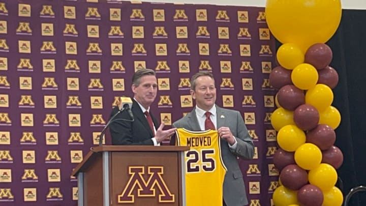 Gophers AD Mark Coyle (left) with new men's basketball head coach Niko Medved (right) Gophers AD Mark Coyle (left) with new men's basketball head coach Niko Medved (right)