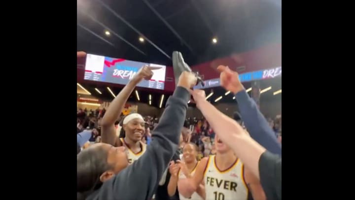 The Fever celebrated with Caitlin Clark's Nike Air Force 1's after they defeated the Dream Thursday night.