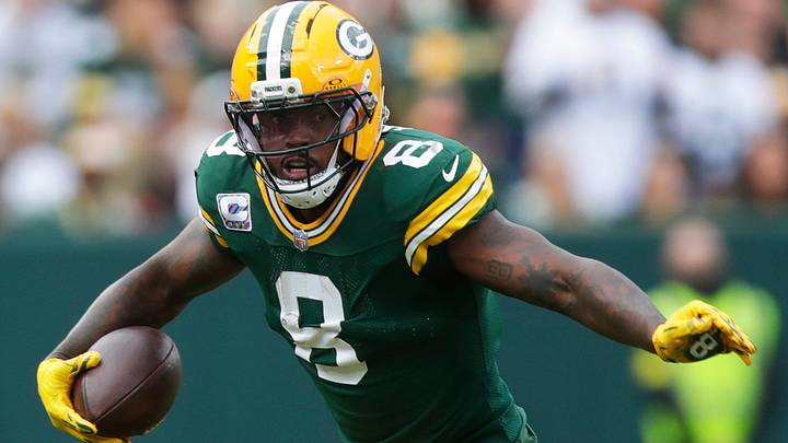 Green Bay Packers running back Josh Jacobs (8) runs the ball during a game against the Cincinnati Bengals last season.