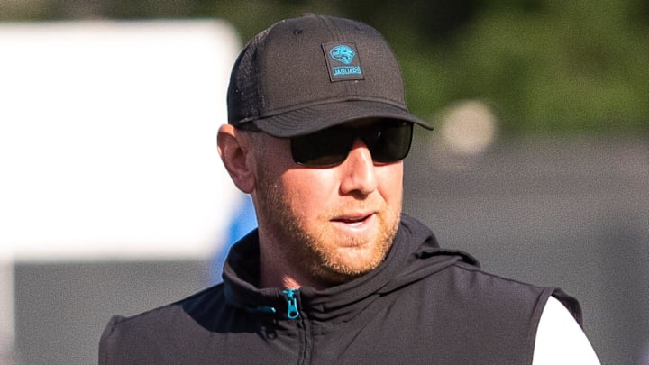 Jacksonville Jaguars Head Coach Liam Coen talks with Jacksonville Jaguars wide receiver Brian Thomas Jr. during an NFL training camp session ten at the Miller Electric Center, Tuesday, Aug. 5, 2025, in Jacksonville, Fla. [Doug Engle/Florida Times-Union]