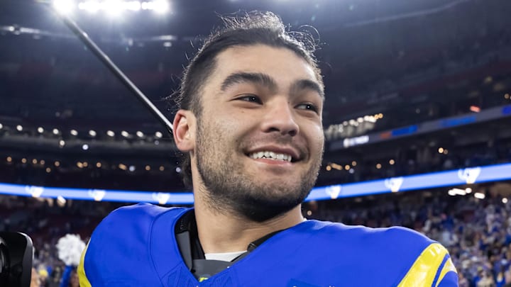 Los Angeles Rams receiver Puka Nacua smiles after a game.