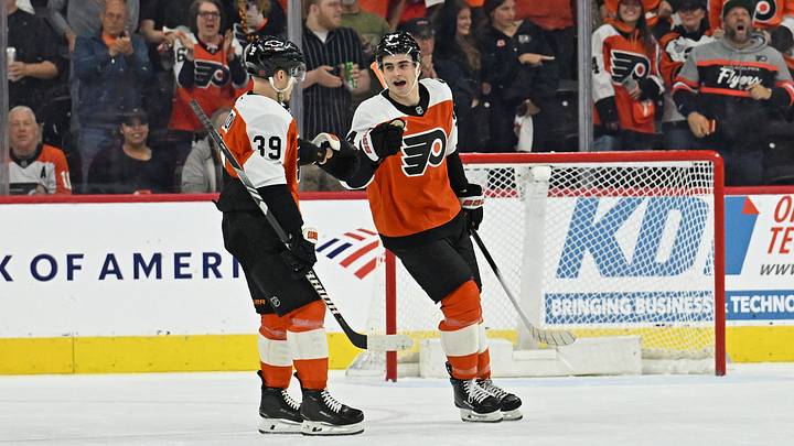 Apr 14, 2026; Philadelphia, Pennsylvania, USA; Philadelphia Flyers right wing Porter Martone (94) celebrates his goal with right wing Matvei Michkov (39) against the Montreal Canadiens during the first period at Xfinity Mobile Arena.