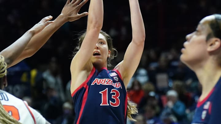 Mar 23, 2024; Storrs, Connecticut, USA; Arizona Wildcats guard Helena Pueyo (13) shoots against the Syracuse Orange in the first half at Harry A. Gampel Pavilion. Mandatory Credit: David Butler II-Imagn Images Mar 23, 2024; Storrs, Connecticut, USA; Arizona Wildcats guard Helena Pueyo (13) shoots against the Syracuse Orange in the first half at Harry A. Gampel Pavilion. Mandatory Credit: David Butler II-Imagn Images
