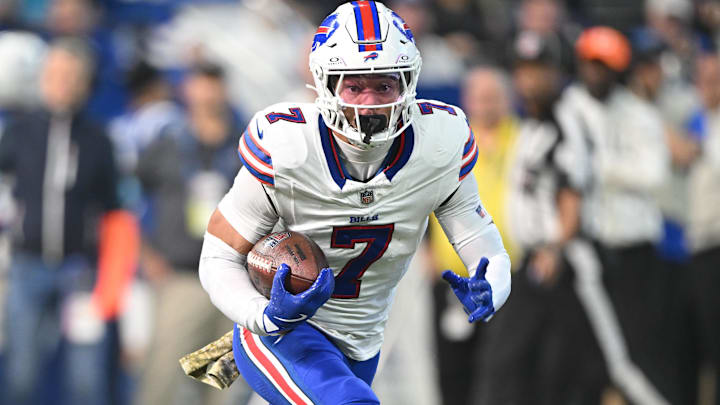 Buffalo Bills cornerback Taron Johnson runs the ball for a touchdown after an interception against the Indianapolis Colts.