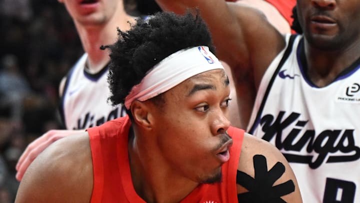 Toronto Raptors forward Scottie Barnes looks for a way past Sacramento Kings forward Precious Achiuwa.