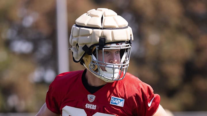 Former San Francisco 49ers tight end Ross Dwelley (82) runs with the football during Training Camp 
