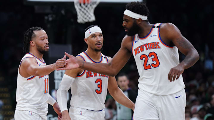 May 7, 2025; Boston, Massachusetts, USA; New York Knicks guard Jalen Brunson (11) and center Mitchell Robinson (23) react after a play against the Boston Celtics in the second half during game two of the second round for the 2025 NBA Playoffs at TD Garden. Mandatory Credit: David Butler II-Imagn Images