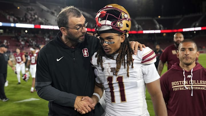Sep 13, 2025; Stanford, California, USA; Stanford Cardinal general manager Andrew Luck (left) greets Boston College Eagles wide receiver Lewis Bond (11) after the game at Stanford Stadium. Sep 13, 2025; Stanford, California, USA; Stanford Cardinal general manager Andrew Luck (left) greets Boston College Eagles wide receiver Lewis Bond (11) after the game at Stanford Stadium.