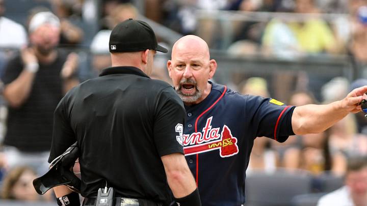 Aug 8, 2026; Bronx, New York, USA; Atlanta Braves manager Walt Weiss (22) questions home plate umpire Dan Merzel (3) after a strike call was overturned by replay to award a walk to New York Yankees shortstop George Lombard Jr. (not pictured) during the fifth inning at Yankee Stadium. Mandatory Credit: John Jones-Imagn Images Aug 8, 2026; Bronx, New York, USA; Atlanta Braves manager Walt Weiss (22) questions home plate umpire Dan Merzel (3) after a strike call was overturned by replay to award a walk to New York Yankees shortstop George Lombard Jr. (not pictured) during the fifth inning at Yankee Stadium. Mandatory Credit: John Jones-Imagn Images