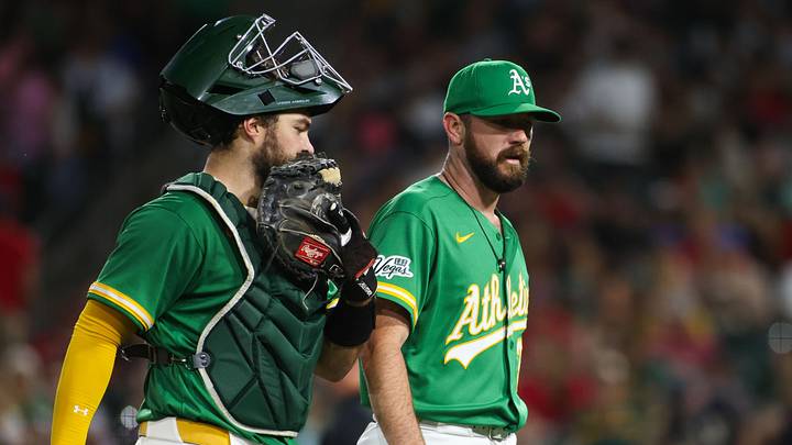 May 1, 2026; West Sacramento, California, USA; Athletics catcher Shea Langeliers (left) and Athletics pitcher Hogan Harris (right) talk as they walk towards the dugout after the final out of the top of the fifth inning against the Cleveland Guardians at Sutter Health Park. Mandatory Credit: Scott Marshall-Imagn Images