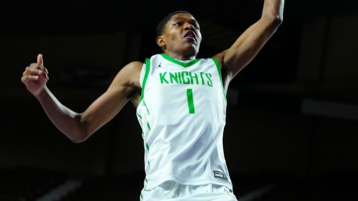 St. Mary’s forward Cameron Williams (1) dunks 